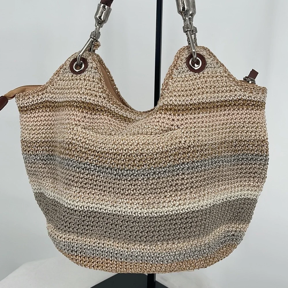 The Sak Woven Straw Hobo in Beige, Tan, Brown